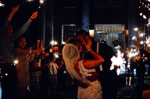Image of a Couple in an Organized Sparkler Exit